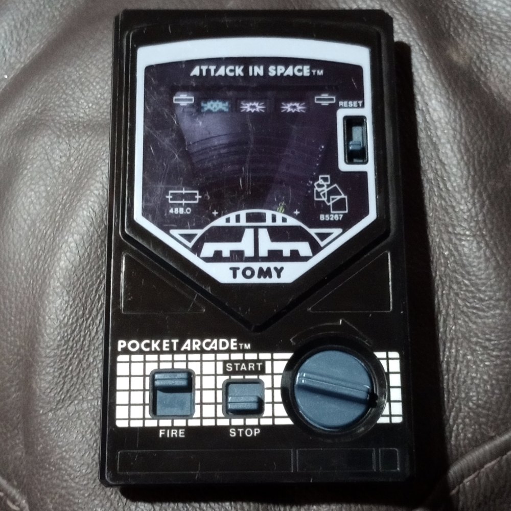 90s Attack in space handheld game